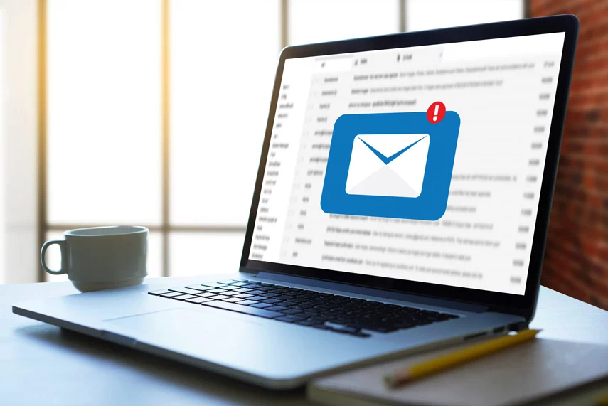 Laptop with a huge icon of unread email messages.