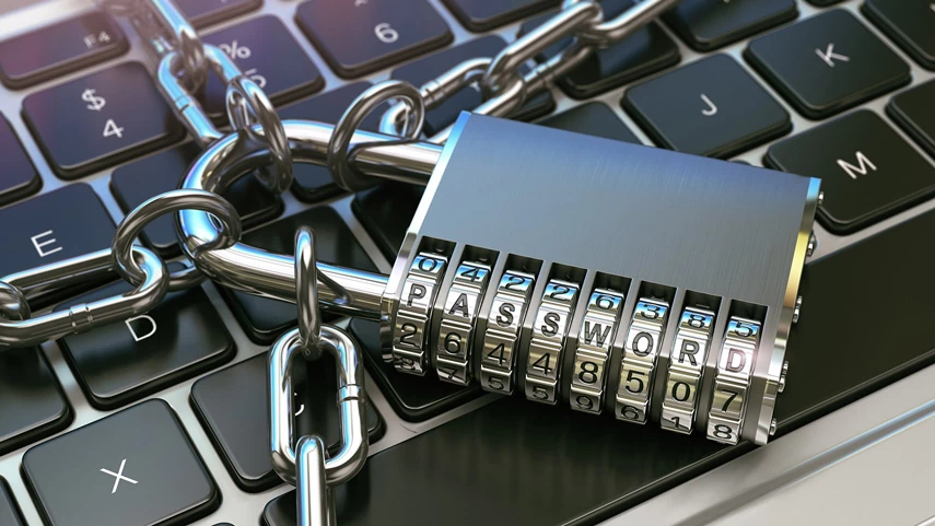 Chain nad padlock on the notebook keyboard.