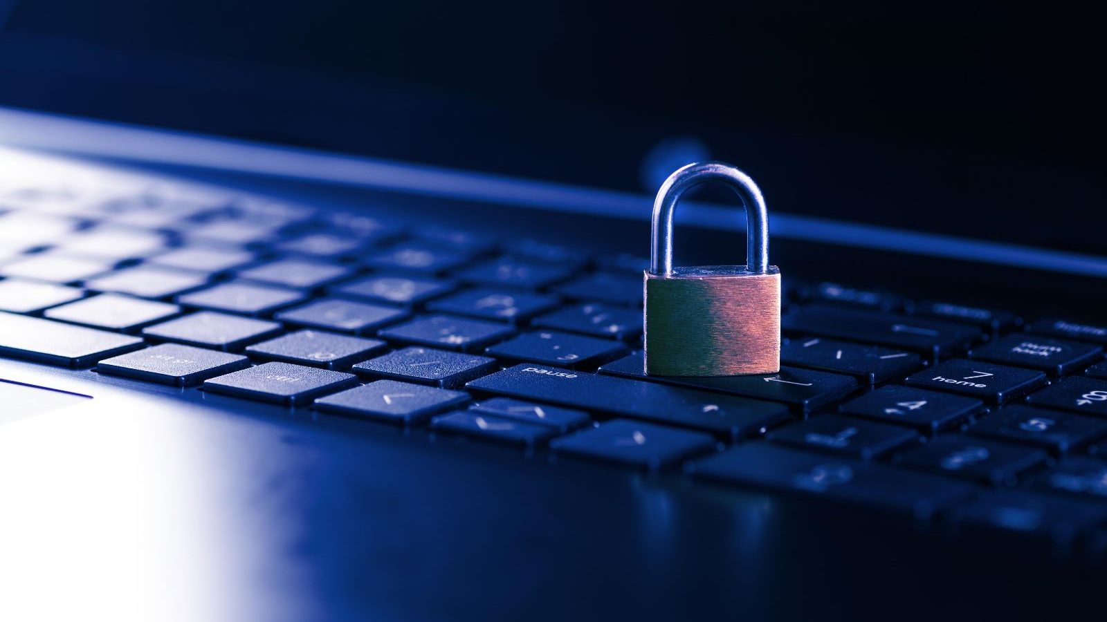 Padlock on notebook keyboard