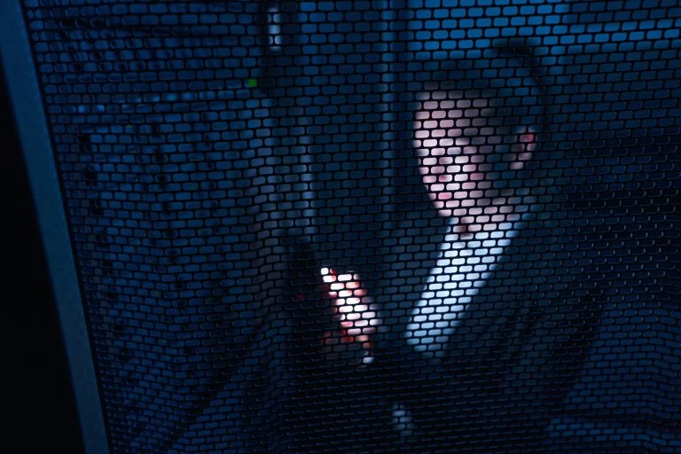 Female IT manager working in server room.