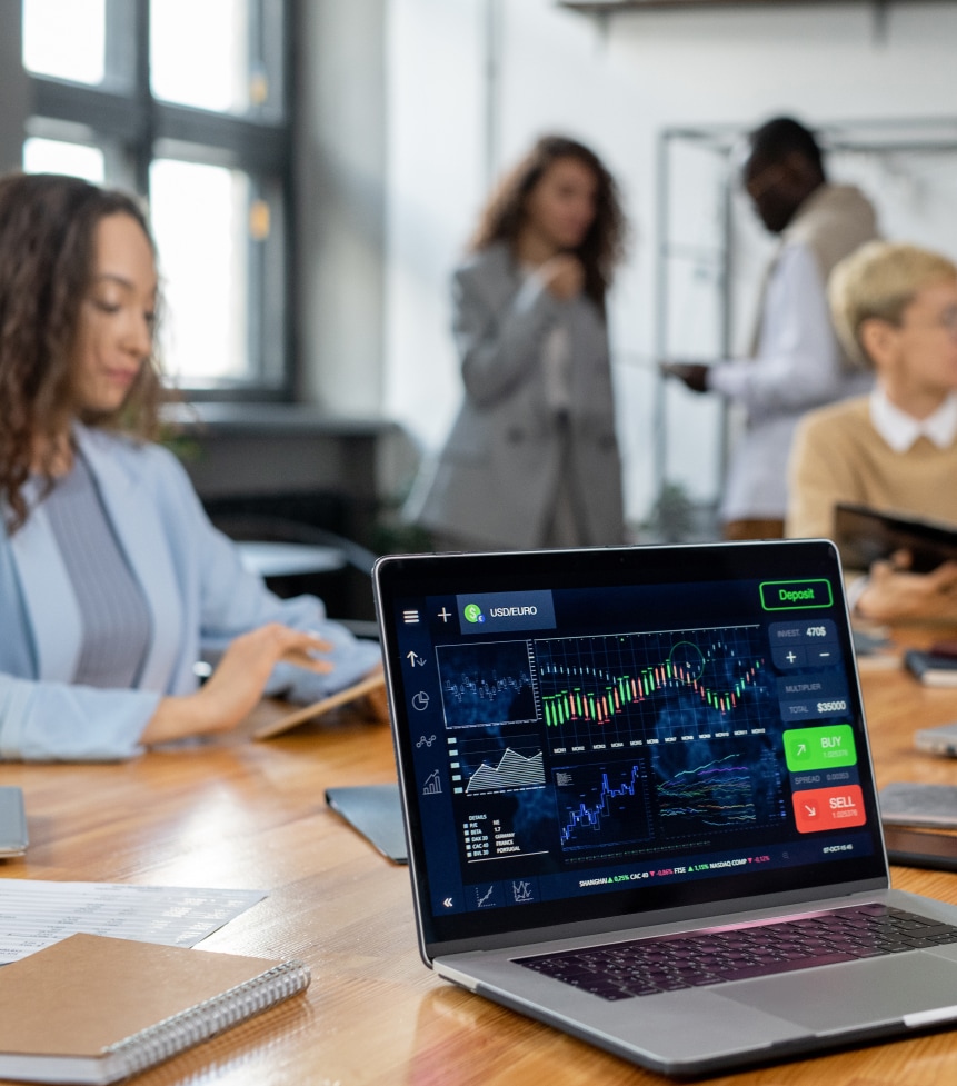 Laptop with Financial analyze on the screen.