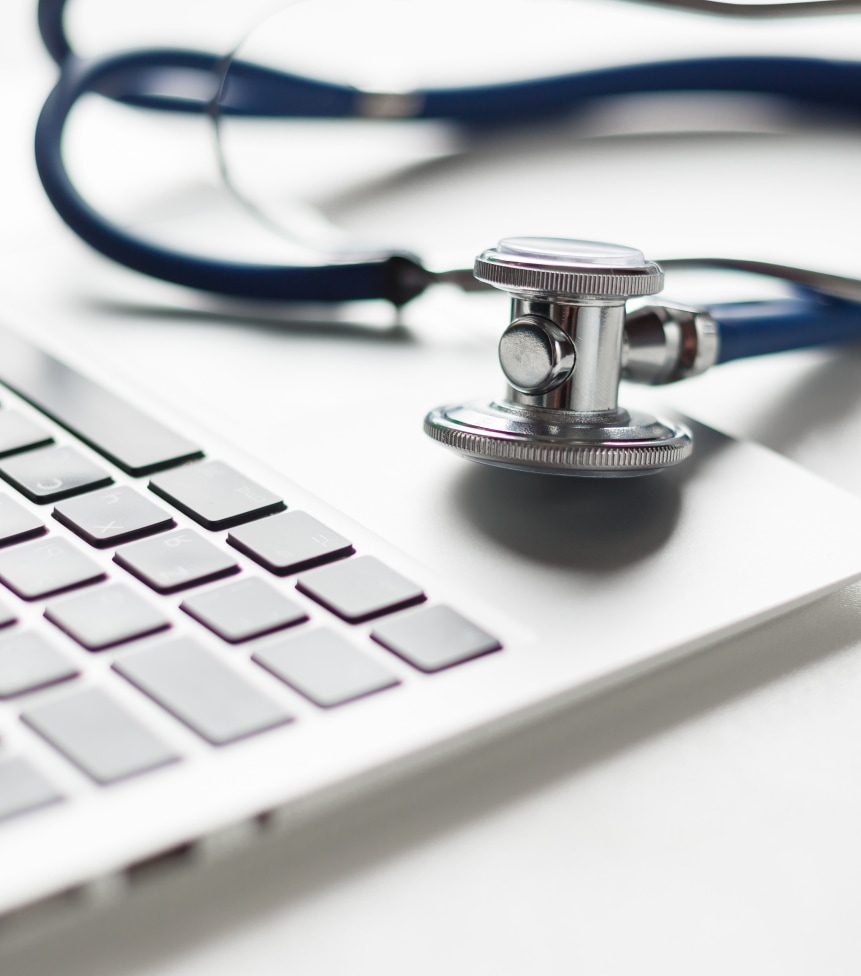 Stethoscope for doctor above to Keyboard