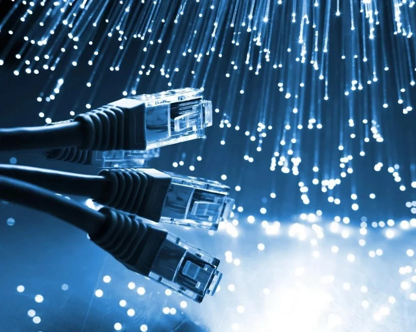 Three RJ-45 with fiber optic ilustration in the background.