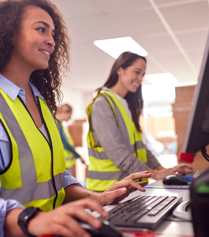 Two women work in logistics center