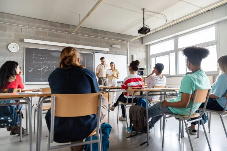 Teen Hispanic girl high school student giving lessons